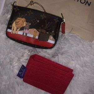 Louis Vuitton lions mini Pochette
